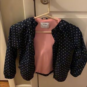 Navy polka dot raincoat